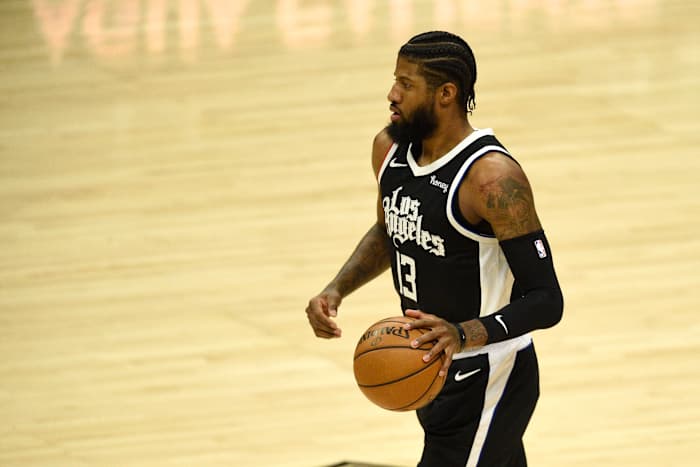 Mar 27, 2021; Los Angeles, California, USA; LA Clippers guard Paul George (13) takes the ball down the court during the first half against the Philadelpha 76ers at Staples Center. Mandatory Credit: Kelvin Kuo-USA TODAY Sports